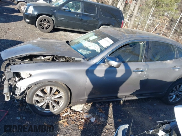 2013 Infiniti M37 with VIN JN1BY1AP3DM511643, listed as a IAAI auction lot 41166670 with Not Provided miles. Bid and sale history available at carsss.com. Image 14.