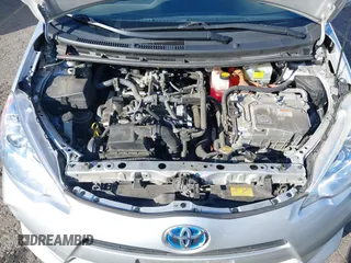 2014 Toyota Prius One z VIN JTDKDTB32E1574607, wystawiony jako IAAI lot #41724312 z przebiegiem 102 612 mil mil oraz . Historia ofert i sprzedaży dostępna na DreamBid. Obrazek 10.