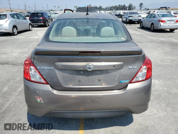 2016 Nissan Versa S with VIN 3N1CN7AP0GL803412, listed as a Copart auction lot 64677645 with 96,788 mi miles and Salvage title. Bid and sale history available at DreamBid. Image 6.