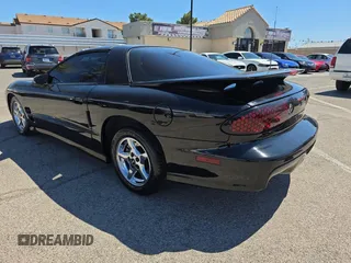 2002 Pontiac Firebird Formula z VIN 2G2FV22G222170769, wystawiony jako Copart lot #56757455 z przebiegiem 120 282 mil mil oraz Tytuł czysty. Historia ofert i sprzedaży dostępna na DreamBid. Obrazek 3.