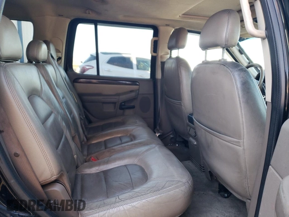 2003 Ford Explorer z VIN 1FMDU75K13ZB31975, wystawiony jako Copart lot #83894734 z przebiegiem 311 881 mil mil oraz Szkoda całkowita • Salvage title. Historia ofert i sprzedaży dostępna na DreamBid. Obrazek 11.