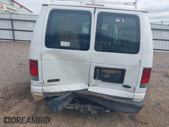2004 Ford Econoline Cargo with VIN 1FTRE14WX4HA06537, listed as a IAAI auction lot 41745018 with 246,963 mi miles. Bid and sale history available at carsss.com. Image 6.