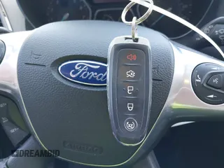 2016 Ford Escape Titanium with VIN 1FMCU9JXXGUB58961, listed as a IAAI auction lot 41772977 with 122,665 mi miles. Bid and sale history available at carsss.com. Image 11.