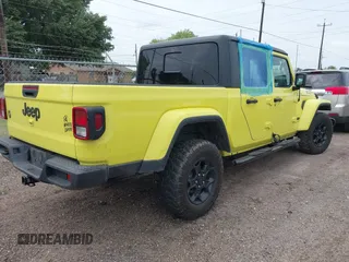 2023 Jeep Gladiator Sport S with VIN 1C6HJTAG1PL576760, listed as a IAAI auction lot 42106618 with 24,738 mi miles and . Bid and sale history available at DreamBid. Image 4.