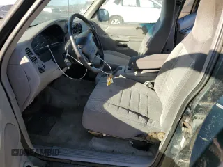 1996 Ford Explorer XL z VIN 1FMDU34X0TUC31973, wystawiony jako Copart lot #87892655 z przebiegiem 142 774 mil mil oraz Tytuł czysty. Historia ofert i sprzedaży dostępna na DreamBid. Obrazek 7.