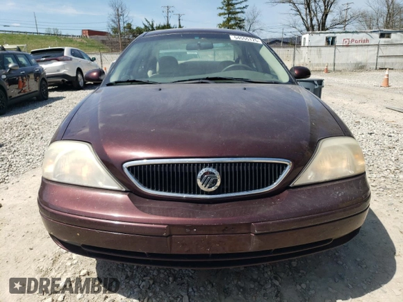 2000 Mercury Sable LS Premium z VIN 1MEFM55S9YA642372, wystawiony jako Copart lot #54555125 z przebiegiem 124 642 mil mil oraz Szkody całkowita. Historia ofert i sprzedaży dostępna na DreamBid. Obrazek 5.