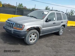 2001 Jeep Grand Cherokee Laredo with VIN 1J4GW48S11C503427, listed as a IAAI auction lot 40004360 with 232,712 mi miles and . Bid and sale history available at DreamBid. Image 2.