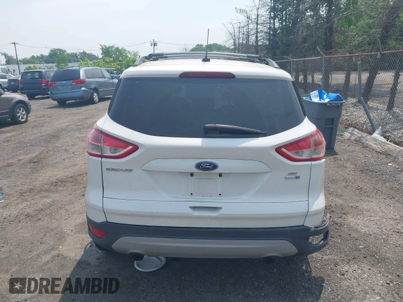 2013 Ford Escape SE z VIN 1FMCU9GXXDUD82847, wystawiony jako IAAI lot #42436360 z przebiegiem 142 071 mil mil oraz . Historia ofert i sprzedaży dostępna na DreamBid. Obrazek 15.