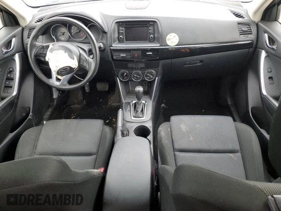 2015 Mazda CX-5 Sport z VIN JM3KE4BY2F0516574, wystawiony jako Copart lot #84100544 z przebiegiem Nie podano mil oraz Szkoda całkowita • Salvage title. Historia ofert i sprzedaży dostępna na DreamBid. Obrazek 8.