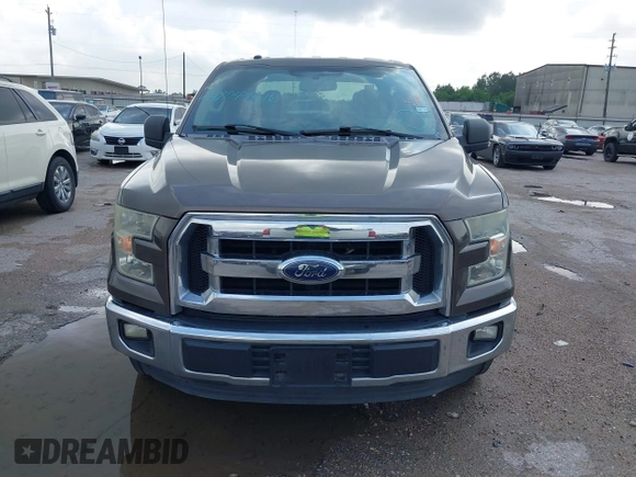 2015 Ford F-150 XLT with VIN 1FTEW1C81FKD15088, listed as a IAAI auction lot 42044616 with 159,248 mi miles and . Bid and sale history available at carsss.com. Image 12.