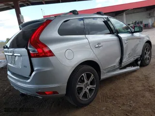 2015 Volvo XC60 T6 Platinum with VIN YV4902RMXF2719971, listed as a IAAI auction lot 41970301 with 63,399 mi miles. Bid and sale history available at carsss.com. Image 4.