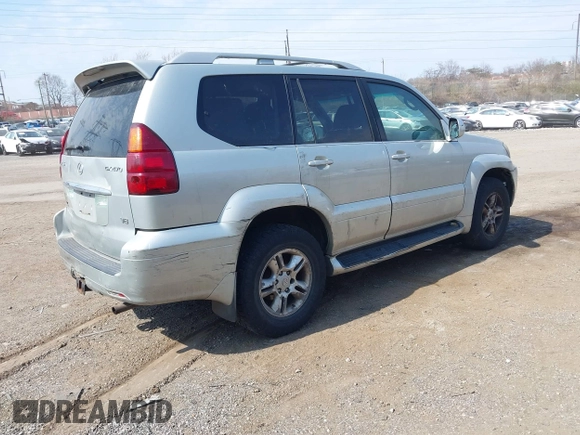 2003 Lexus GX 470 z VIN JTJBT20X930023643, wystawiony jako IAAI lot #41920858 z przebiegiem 218 926 mil mil oraz . Historia ofert i sprzedaży dostępna na DreamBid. Obrazek 4.