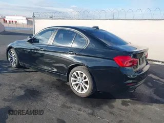 2017 BMW 3 Series 320i with VIN WBA8E1G50HNU14516, listed as a IAAI auction lot 41433532 with 119,742 mi miles. Bid and sale history available at carsss.com. Image 3.