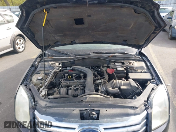 2008 Ford Fusion S with VIN 3FAHP06ZX8R270083, listed as a IAAI auction lot 42086056 with 174,031 mi miles. Bid and sale history available at carsss.com. Image 10.