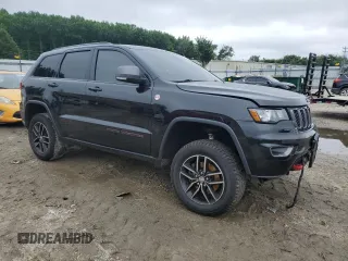 2017 Jeep Grand Cherokee Trailhawk with VIN 1C4RJFLG7HC674060, listed as a Copart auction lot 61130225 with 79,351 mi miles and Salvage title. Bid and sale history available at DreamBid. Image 4.