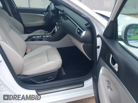 2023 Genesis G70 2.0T z VIN KMTG34TA7PU131917, wystawiony jako IAAI lot #42142928 z przebiegiem 32 158 mil mil oraz . Historia ofert i sprzedaży dostępna na DreamBid. Obrazek 5.