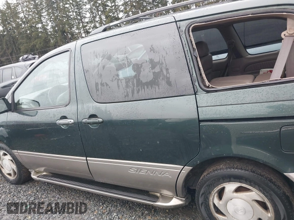 2001 Toyota Sienna LE with VIN 4T3ZF13C91U352296, listed as a IAAI auction lot 41647762 with 262,803 mi miles. Bid and sale history available at carsss.com. Image 14.