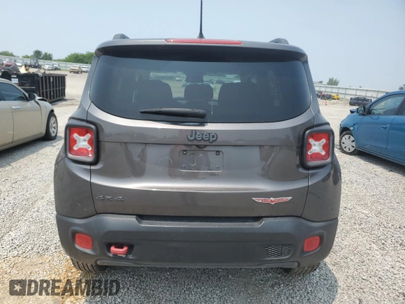 2016 Jeep Renegade Trailhawk with VIN ZACCJBCT5GPC75735, listed as a Copart auction lot 60299005 with 121,990 mi miles and Salvage title. Bid and sale history available at DreamBid. Image 6.