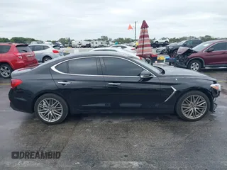 2021 Genesis G70 2.0T with VIN KMTG64LA8MU067129, listed as a IAAI auction lot 41364886 with 48,043 mi miles and . Bid and sale history available at DreamBid. Image 14.