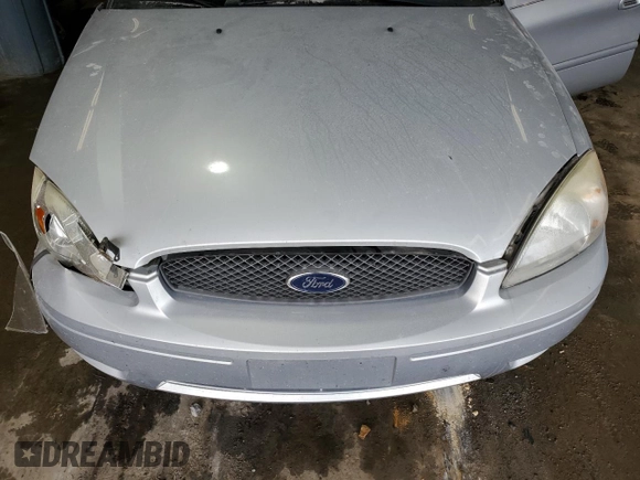 2006 Ford Taurus with VIN 1FAHP56U46A162809, listed as a Copart auction lot 60476125 with 95,542 mi miles and Salvage title. Bid and sale history available at DreamBid. Image 11.