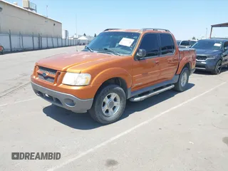 2001 Ford Explorer Sport Trac with VIN 1FMZU67E91UA85958, listed as a IAAI auction lot 42454056 with 230,627 mi miles and . Bid and sale history available at DreamBid. Image 2.