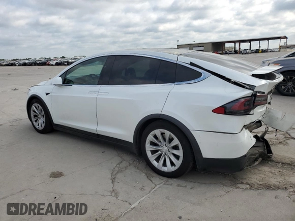 2020 Tesla Model X Long Range with VIN 5YJXCBE24LF253100, listed as a Copart auction lot 53601095 with Not Provided miles and Salvage Title. Bid and sale history available at carsss.com. Image 2.