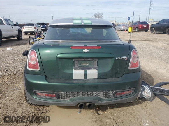 2012 MINI Coupe S z VIN WMWSX3C58CT465767, wystawiony jako Copart lot #88276985 z przebiegiem 113 023 mil mil oraz Szkoda całkowita • Salvage title. Historia ofert i sprzedaży dostępna na DreamBid. Obrazek 6.