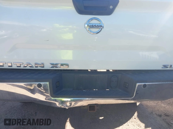 2016 Nissan Titan SL z VIN 1N6BA1F21GN504118, wystawiony jako IAAI lot #41729710 z przebiegiem 127 760 mil mil oraz . Historia ofert i sprzedaży dostępna na DreamBid. Obrazek 16.