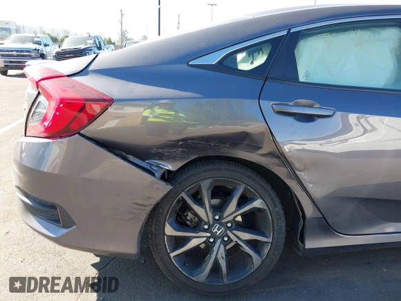 2021 Honda Civic Sedan Sport with VIN 19XFC2F88ME201751, listed as a IAAI auction lot 41643759 with 111,796 mi miles. Bid and sale history available at carsss.com. Image 6.
