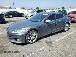 2014 Tesla Model S 60 with VIN 5YJSA1H17EFP36595, listed as a Copart auction lot 53705035 with 148,254 mi miles and Salvage title. Bid and sale history available at DreamBid. Image 1.