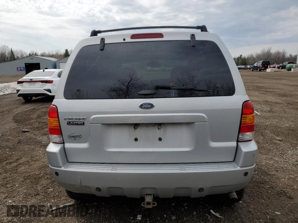 2003 Ford Escape Limited z VIN 1FMCU941X3KC33512, wystawiony jako Copart lot #51029495 z przebiegiem 146 616 mil mil oraz Szkoda całkowita • Salvage title. Historia ofert i sprzedaży dostępna na DreamBid. Obrazek 6.