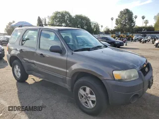 2006 Ford Escape XLS with VIN 1FMYU02Z76KA05322, listed as a Copart auction lot 49807855 with 127,084 mi miles and Salvage Title. Bid and sale history available at carsss.com. Image 4.