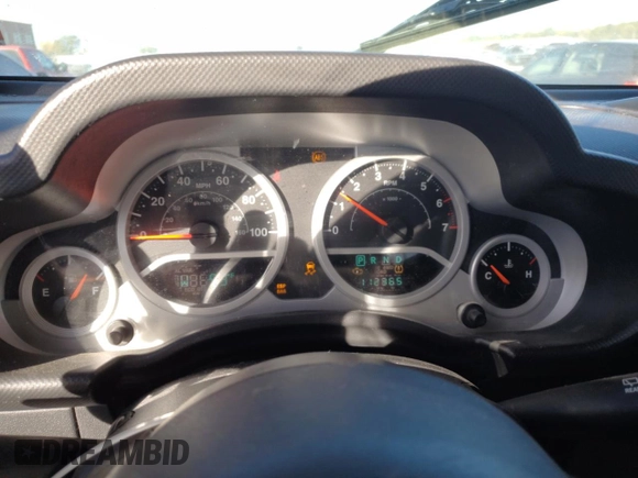2010 Jeep Wrangler Unlimited Sahara with VIN 1J4BA5H1XAL196555, listed as a Copart auction lot 76704534 with 112,365 mi miles and Salvage Title. Bid and sale history available at carsss.com. Image 9.