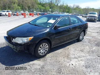 2014 Toyota Camry L with VIN 4T4BF1FK9ER408973, listed as a IAAI auction lot 42074491 with 183,934 mi miles and . Bid and sale history available at DreamBid. Image 19.