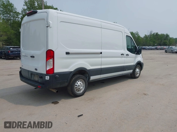 2024 Ford Transit Cargo with VIN 1FTBR2C82RKA72122, listed as a IAAI auction lot 42432209 with 26,806 mi miles and . Bid and sale history available at DreamBid. Image 4.