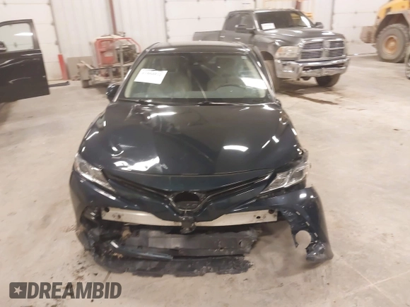 2020 Toyota Camry LE with VIN 4T1C11AK5LU926564, listed as a IAAI auction lot 41864812 with 104,212 mi miles and . Bid and sale history available at carsss.com. Image 12.