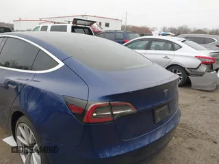 2019 Tesla Model 3 Long Range with VIN 5YJ3E1EB9KF454007, listed as a IAAI auction lot 41769346 with 141,609 mi miles. Bid and sale history available at carsss.com. Image 6.