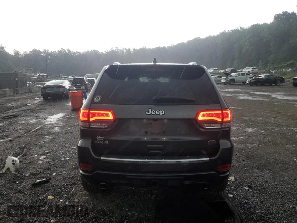 2017 Jeep Grand Cherokee Overland with VIN 1C4RJFCG4HC730861, listed as a Copart auction lot 62918825 with 77,228 mi miles and Salvage title. Bid and sale history available at DreamBid. Image 6.