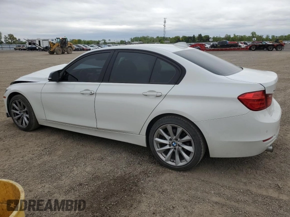 2013 BMW 3 Series 320i xDrive with VIN WBA3C3C51DF978651, listed as a Copart auction lot 58507915 with 117,025 mi miles and Salvage title. Bid and sale history available at DreamBid. Image 2.
