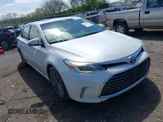 2016 Toyota Avalon Limited with VIN 4T1BK1EB9GU214597, listed as a IAAI auction lot 41718463 with 113,993 mi miles and . Bid and sale history available at carsss.com. Image 1.