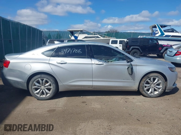 2018 Chevrolet Impala LT with VIN 1G1105SA6JU137163, listed as a IAAI auction lot 41974788 with 108,388 mi miles and . Bid and sale history available at DreamBid. Image 13.