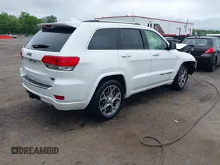 2020 Jeep Grand Cherokee Overland z VIN 1C4RJFCG9LC197401, wystawiony jako IAAI lot #42186412 z przebiegiem 64 870 mil mil oraz . Historia ofert i sprzedaży dostępna na DreamBid. Obrazek 4.