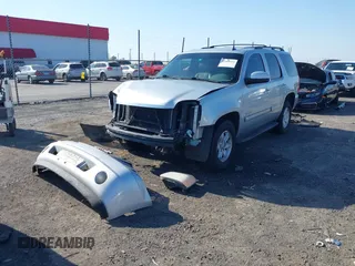 2012 GMC Yukon SLT z VIN 1GKS1CE01CR121916, wystawiony jako IAAI lot #41989372 z przebiegiem 223 608 mil mil oraz . Historia ofert i sprzedaży dostępna na DreamBid. Obrazek 2.