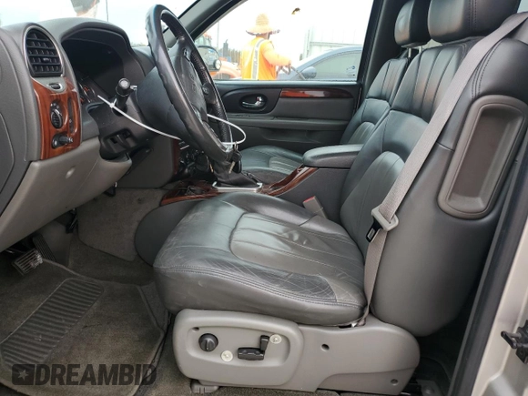 2004 GMC Envoy SLT with VIN 1GKDT13S742106035, listed as a Copart auction lot 77692884 with 122,188 mi miles and Non Repairable. Bid and sale history available at DreamBid. Image 7.