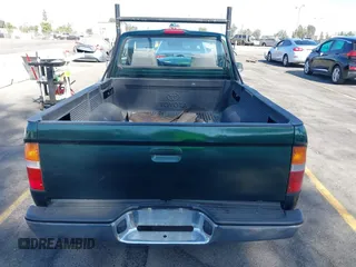1999 Toyota Tacoma with VIN 4TANL42N7XZ481489, listed as a IAAI auction lot 40365153 with 218,971 mi miles. Bid and sale history available at carsss.com. Image 16.