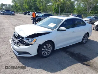 2015 Volkswagen Jetta SE z VIN 3VWD17AJXFM327152, wystawiony jako IAAI lot #42055458 z przebiegiem 69 412 mil mil oraz . Historia ofert i sprzedaży dostępna na DreamBid. Obrazek 2.