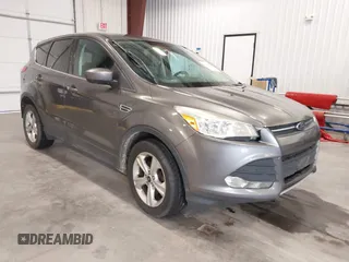 2014 Ford Escape SE z VIN 1FMCU9G94EUA15591, wystawiony jako IAAI lot #42454617 z przebiegiem 146 029 mil mil oraz . Historia ofert i sprzedaży dostępna na DreamBid. Obrazek 1.
