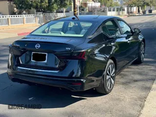 2022 Nissan Altima 2.5 SV with VIN 1N4BL4DV4NN340314, listed as a Copart auction lot 54802145 with 57,508 mi miles and Clean Title. Bid and sale history available at carsss.com. Image 4.