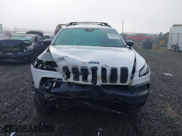 2017 Jeep Cherokee Trailhawk L Plus with VIN 1C4PJMBS2HD225011, listed as a IAAI auction lot 40802716 with 73,714 mi miles. Bid and sale history available at carsss.com. Image 12.