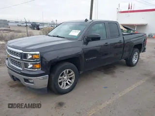 2014 Chevrolet Silverado 1500 LT with VIN 1GCVKREC8EZ325070, listed as a IAAI auction lot 41328199 with 164,009 mi miles and . Bid and sale history available at DreamBid. Image 17.